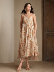 Long apricot dress with rope embroidery and fringes