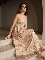 Long apricot dress with rope embroidery and fringes