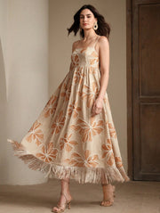 Long apricot dress with rope embroidery and fringes