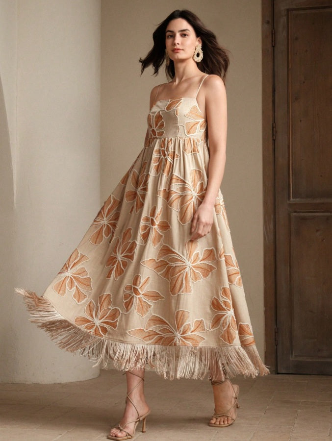Long apricot dress with rope embroidery and fringes