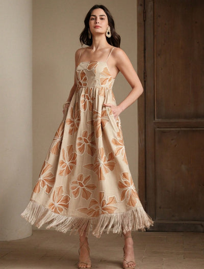 Long apricot dress with rope embroidery and fringes