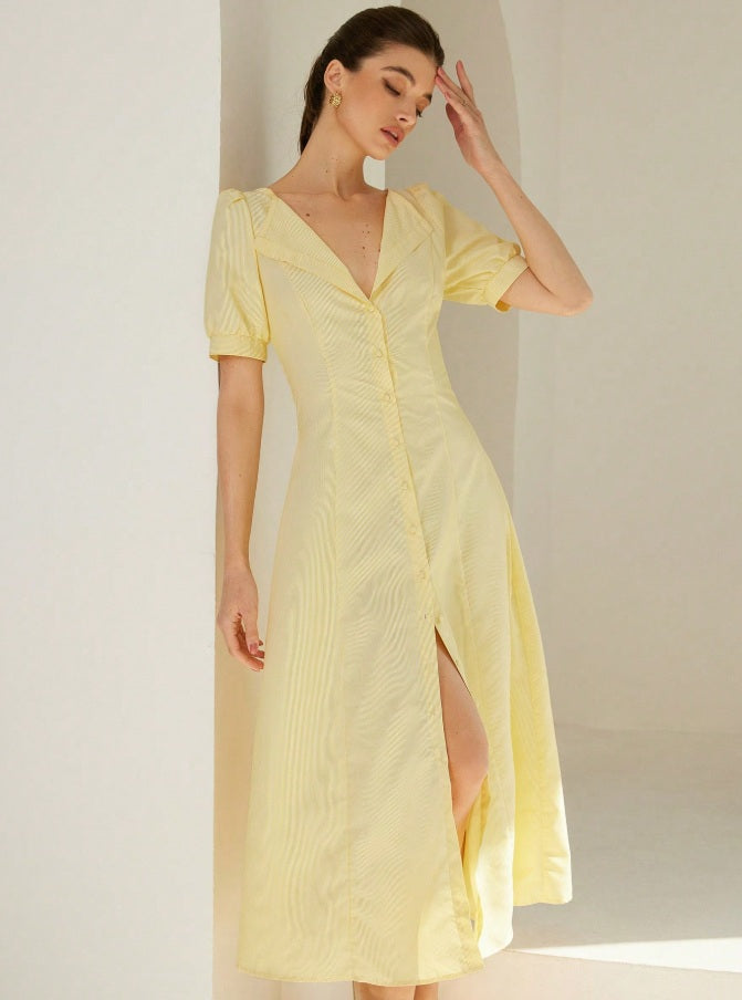 Long striped dress with V-neckline and puff sleeves